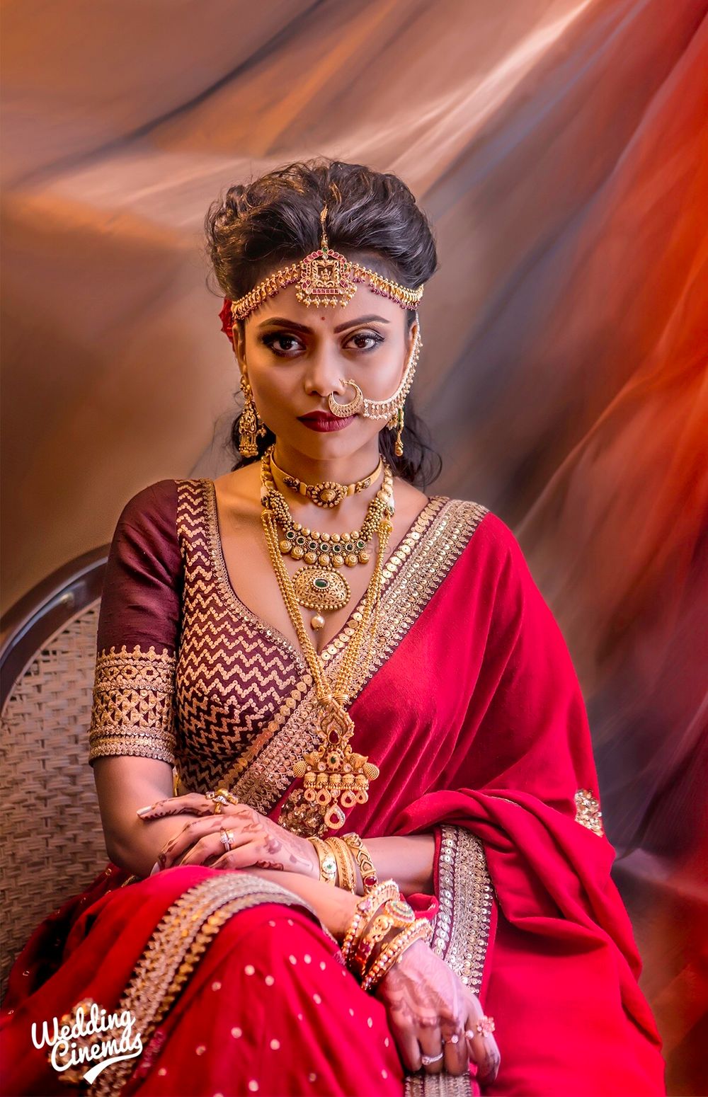 Photo of Unique bridal portrait with layered gold jewellery