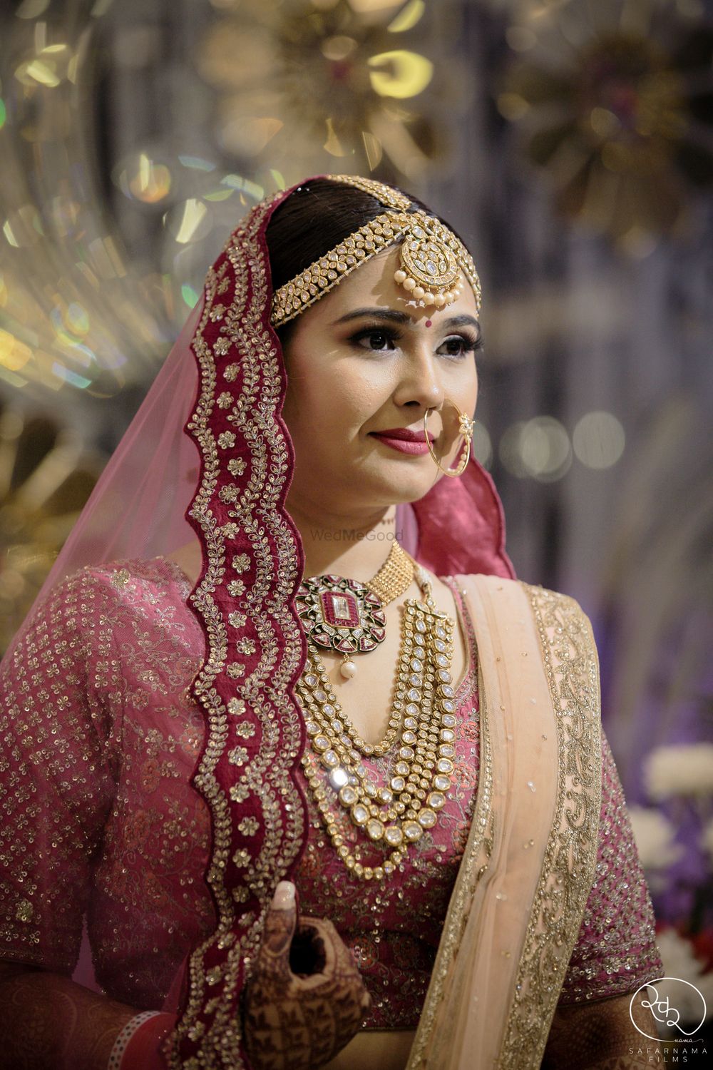 Photo of Unique bridal look in onion pink lehenga
