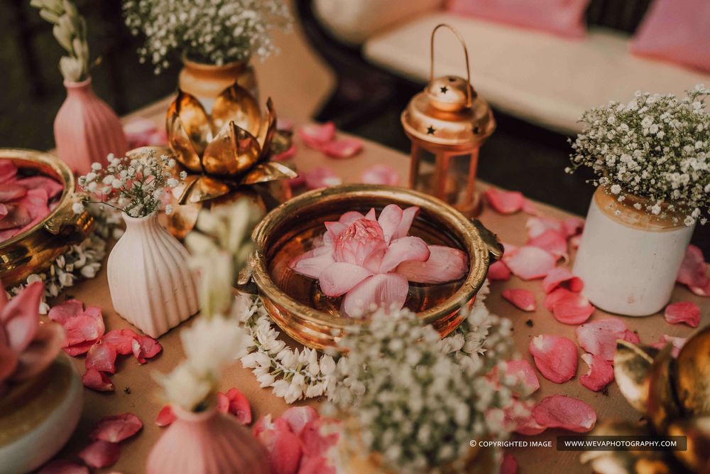 Photo of Corner setting idea with lotus flowers and pickle jars
