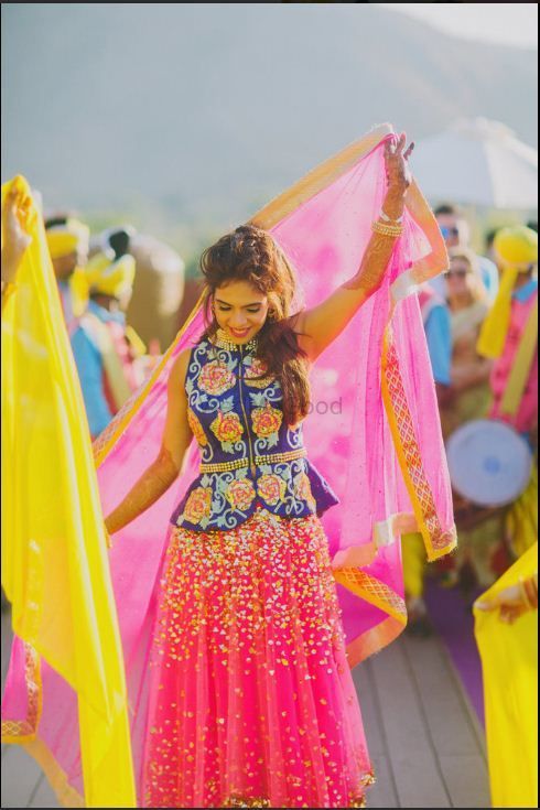 Photo of Pretty shimmer lehenga in pink with a peplum blouse
