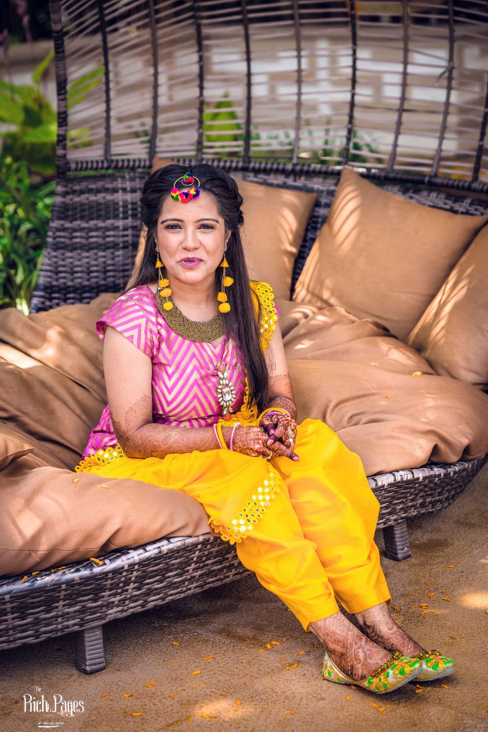Photo of Quirky bride with colourful haldi outfit and juttis