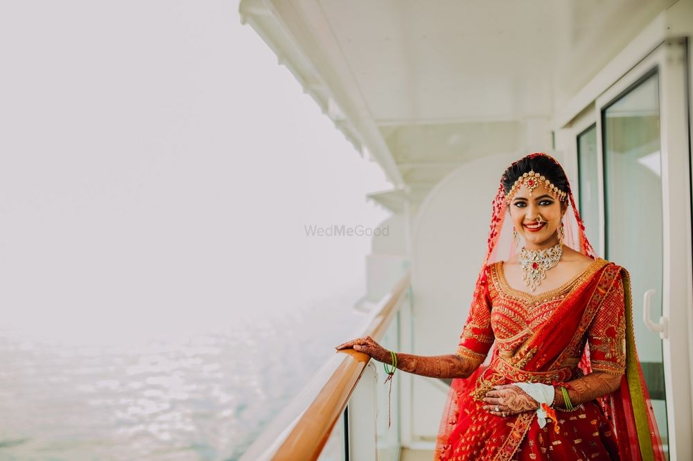 Photo of A bride in red lehenga