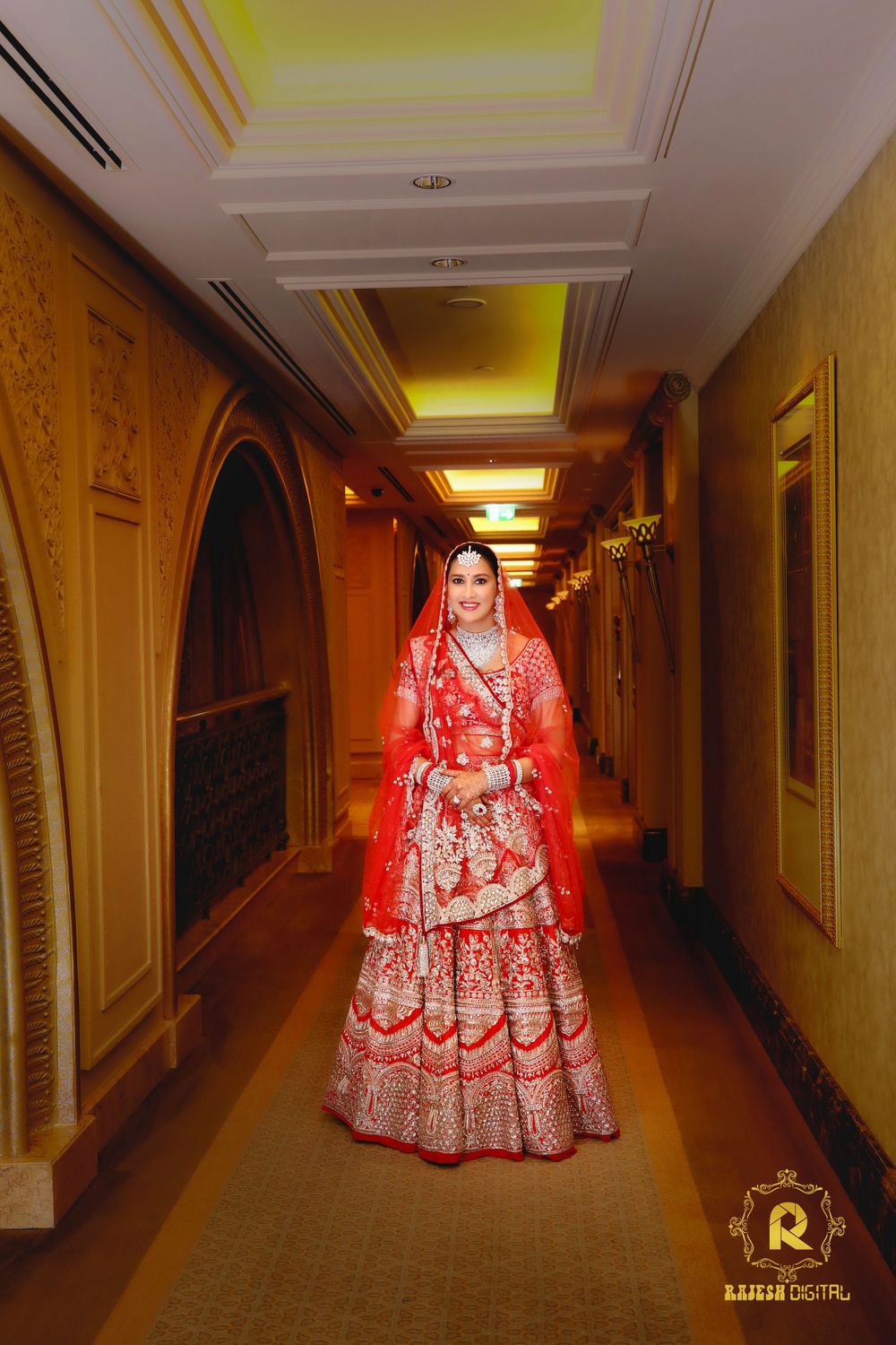 Photo of Red and gold sequin bridal lehenga