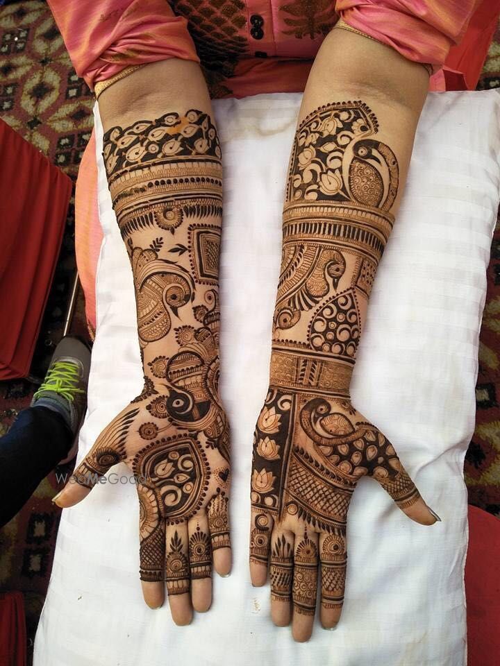 Photo of Beautiful lotus motif and peacock design bridal mehendi