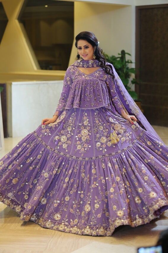 Photo of Pretty lavendar lehenga with floral motifs and long top