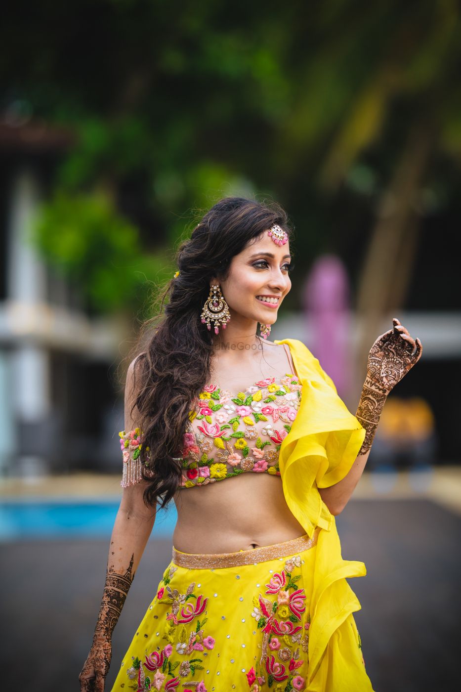 Photo of Mehendi bridal look and portrait in yellow