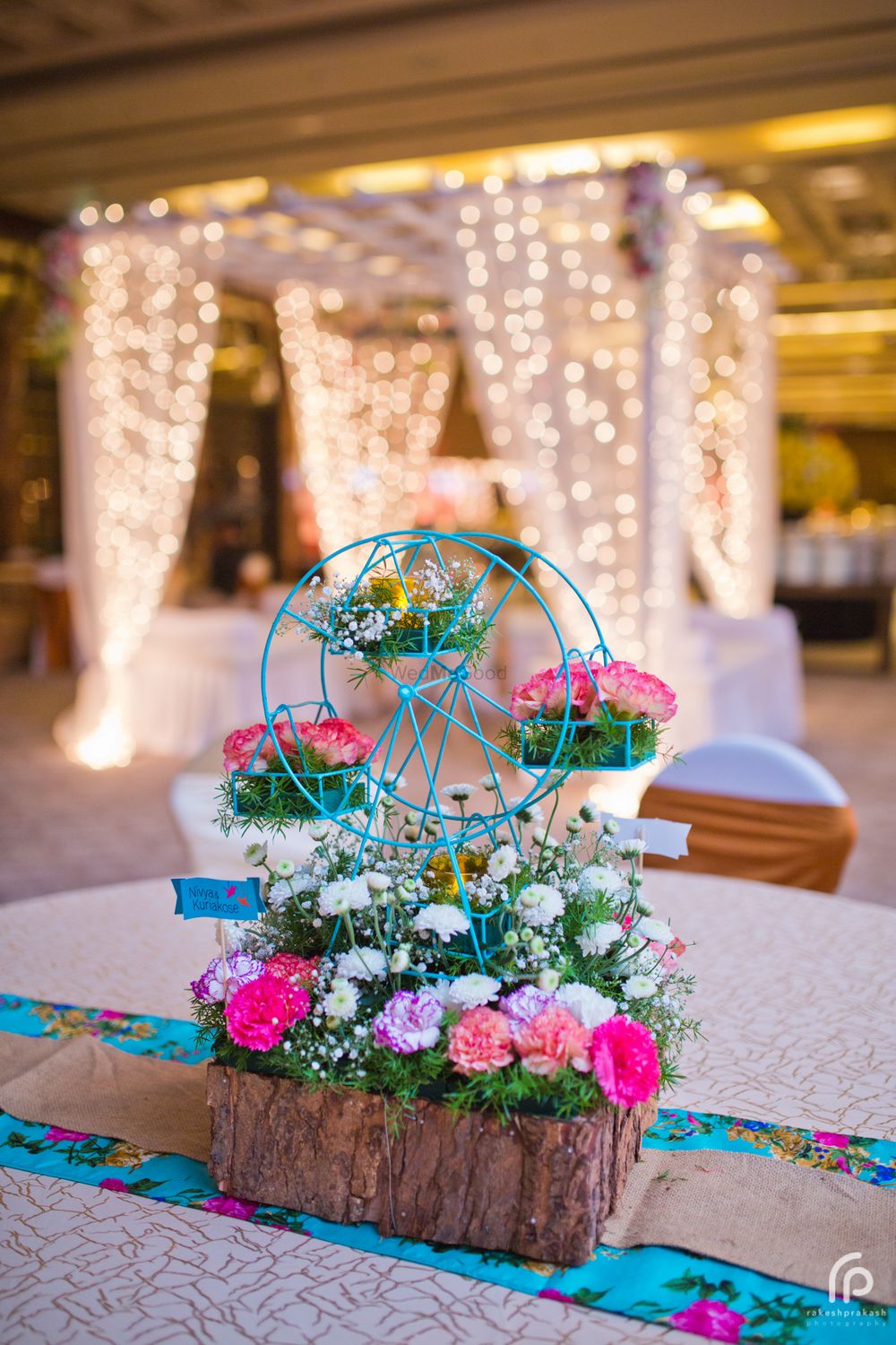 Photo of Tiny Ferris Wheel Floral Arrangement for Centrepiece