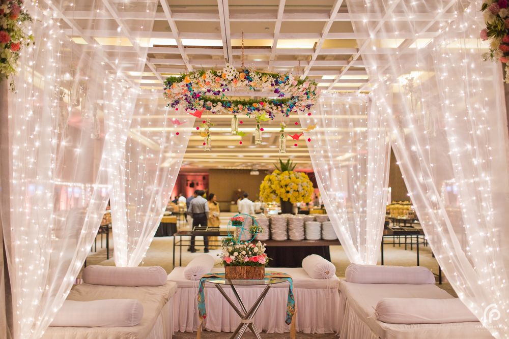 Photo of Sheer Curtains with Fairy Lights in Wedding Decor