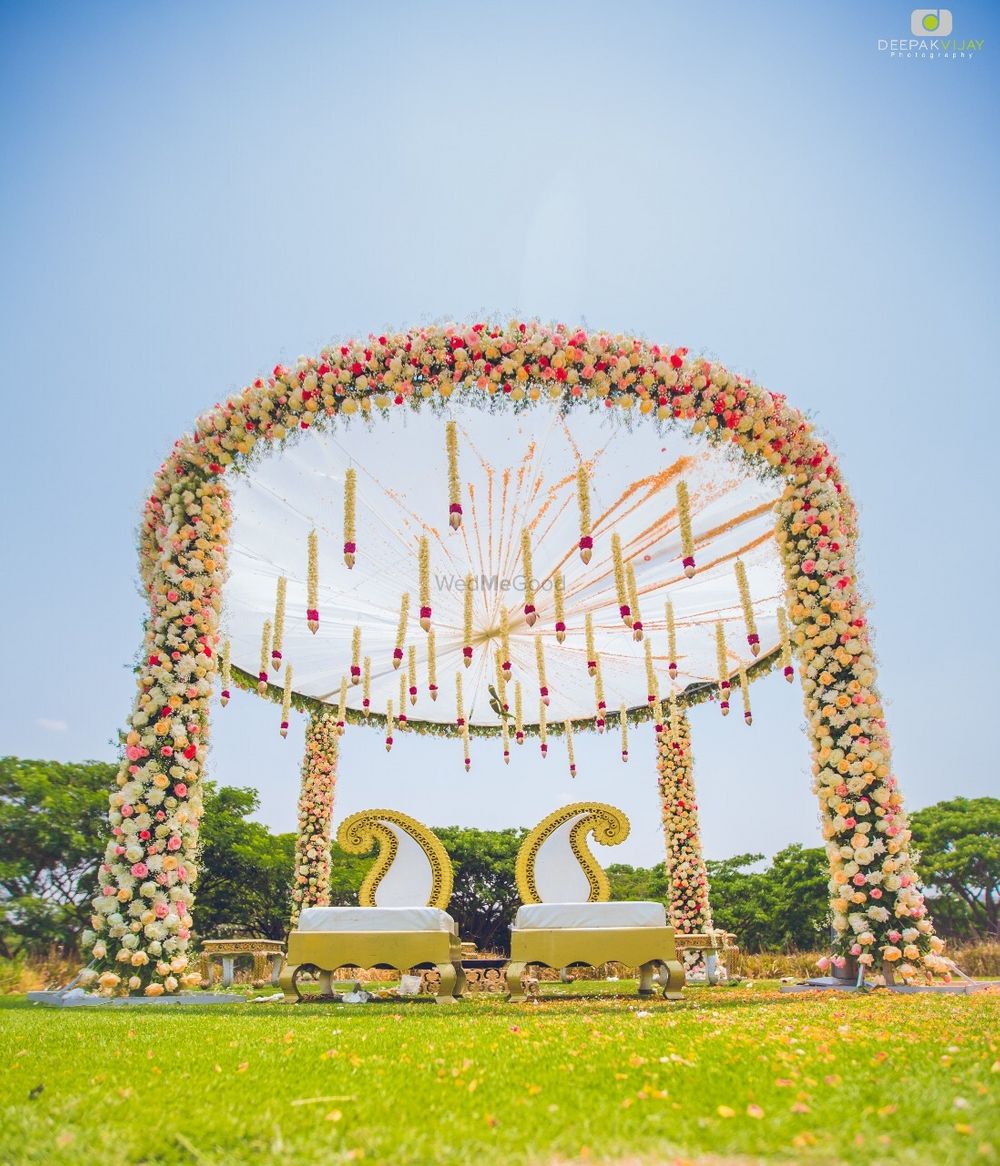 Photo of Circular floral mandap decor with strings