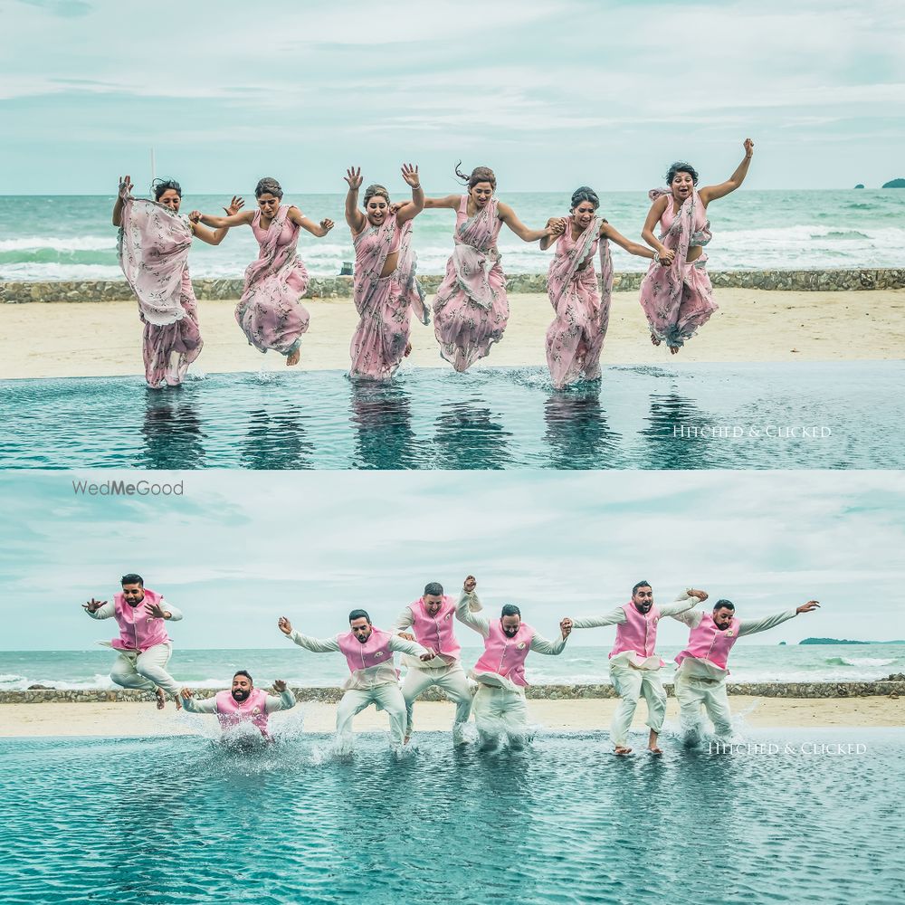 Photo of Matching bridesmaids and groomsmen jumping in water