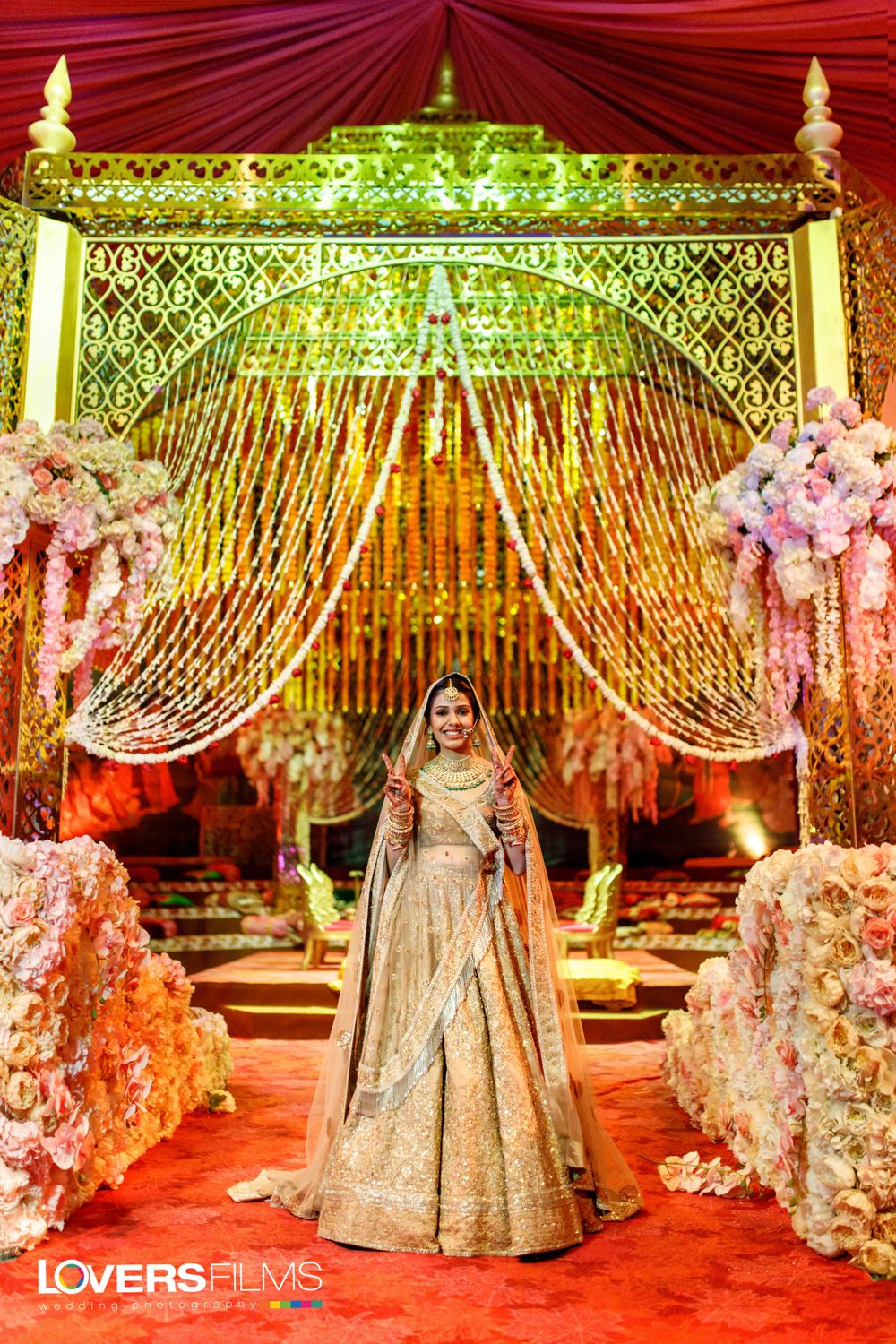 Photo of Wedding day bridal portrait with pretty entrance decor