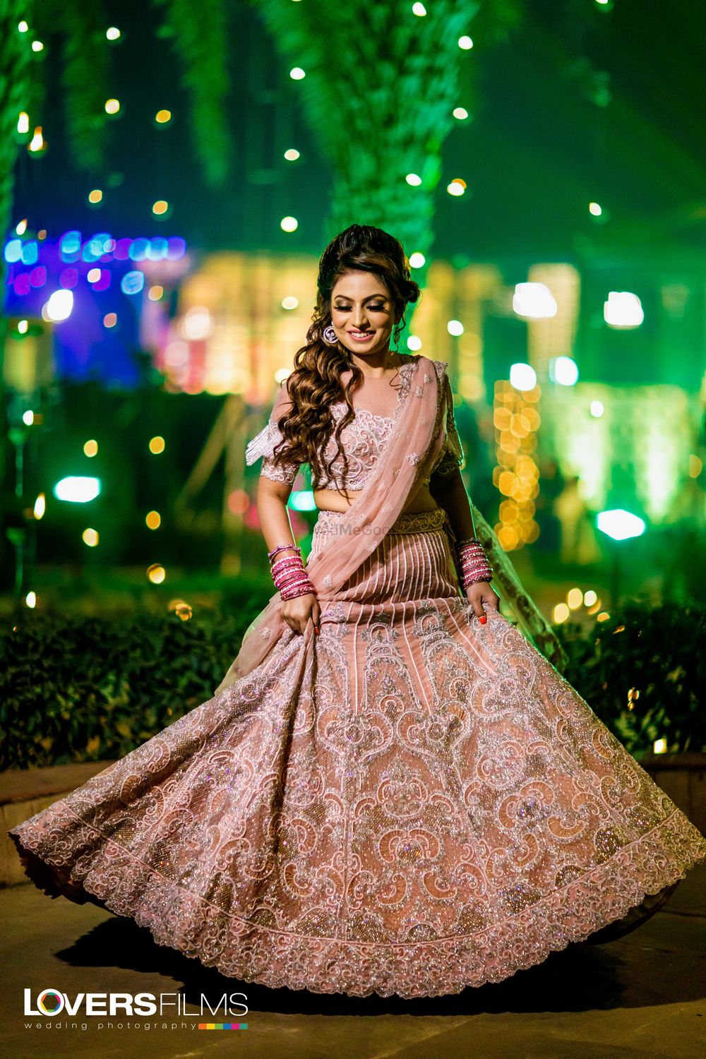 Photo of Peach lehenga for sangeet with embroidery