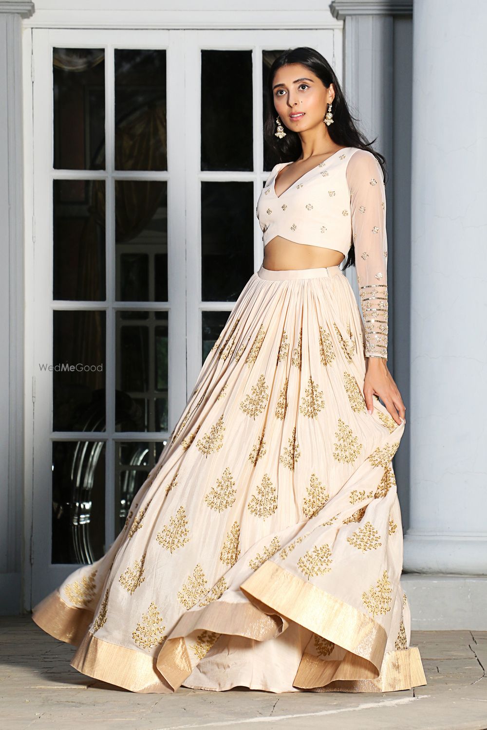 Photo of Ivory and gold engagement lehenga