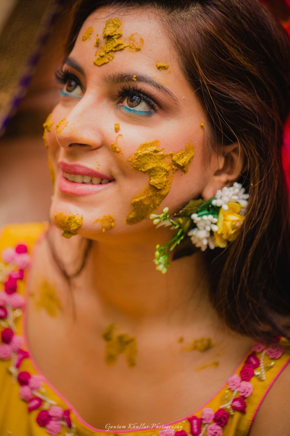 Photo of Floral earring on bride for haldi