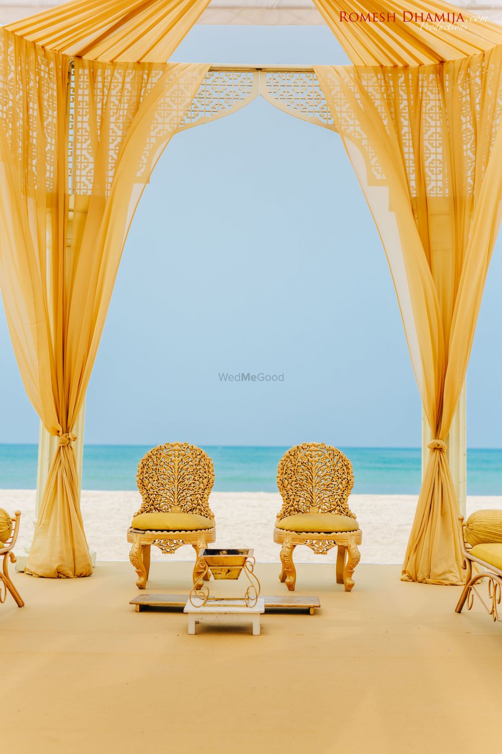 Photo of Yellow simple beachside mandap