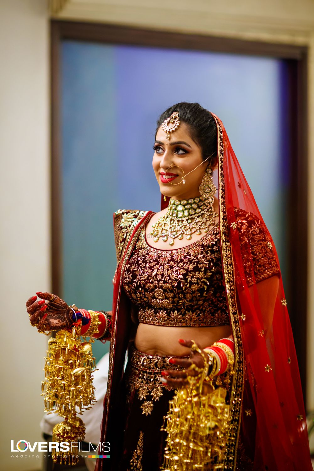 Photo of Maroon bridal lehenga with red dupatta