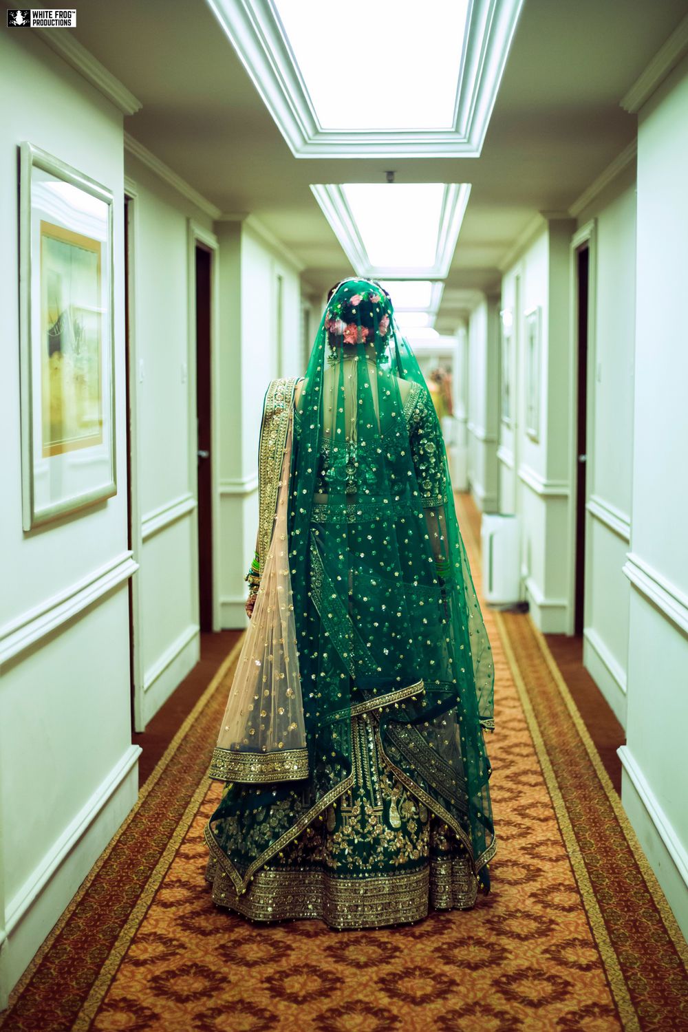 Photo of A bride in dark green