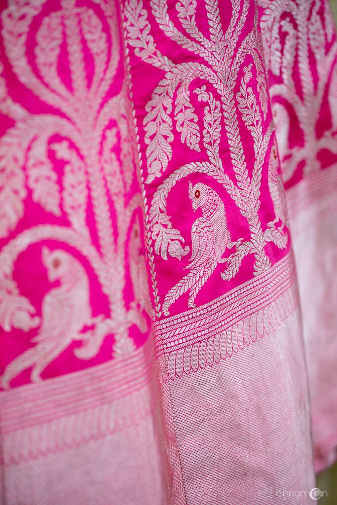 Photo of Bright pink benarasi lehenga with parrot motifs