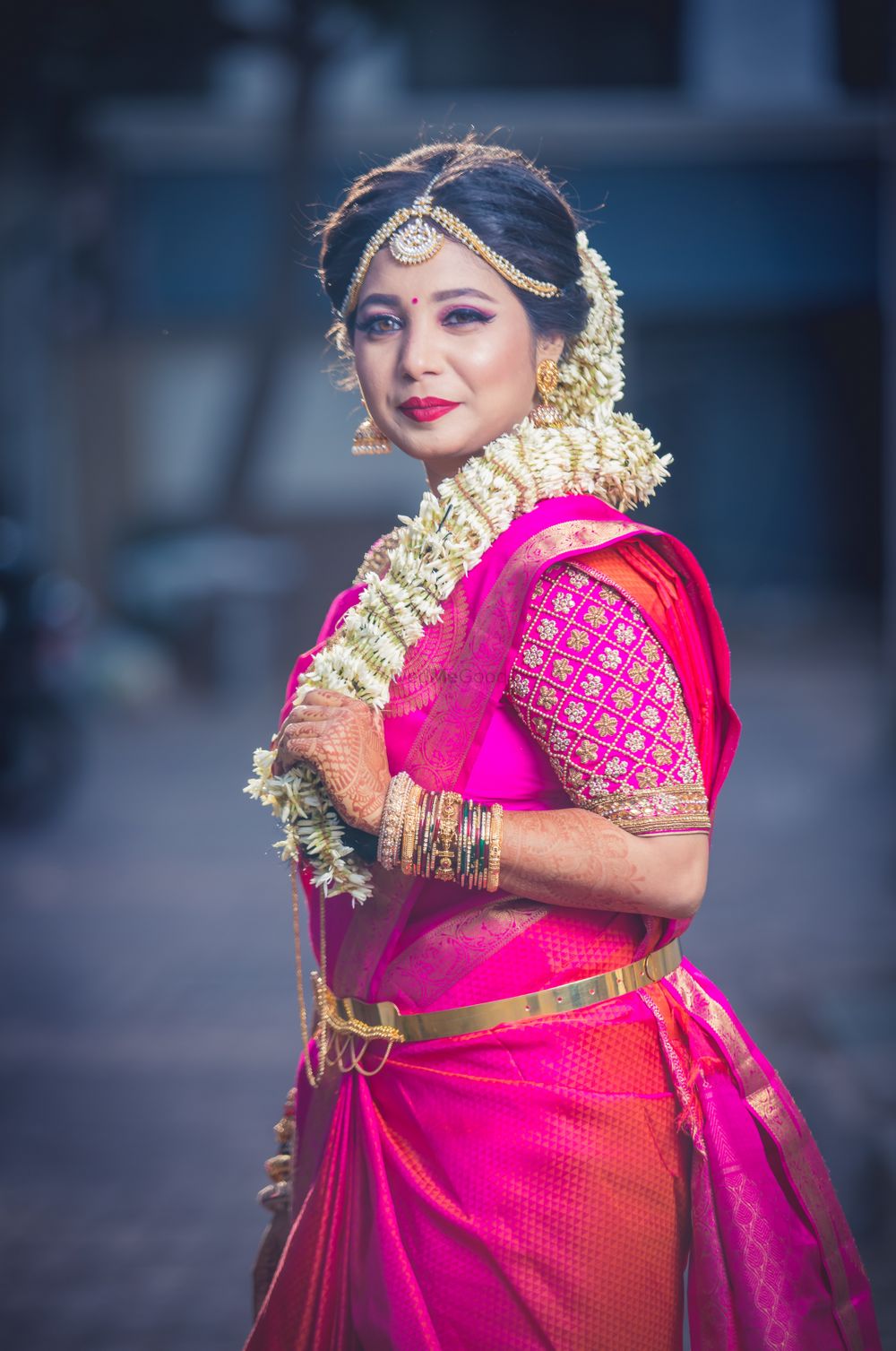 Photo of South Indian bride with floral braided hairstyle