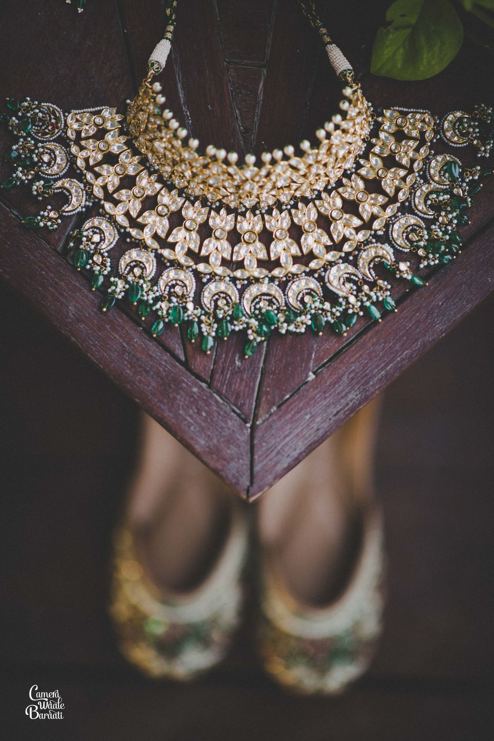 Photo of Dark green jewellery photography with shoes