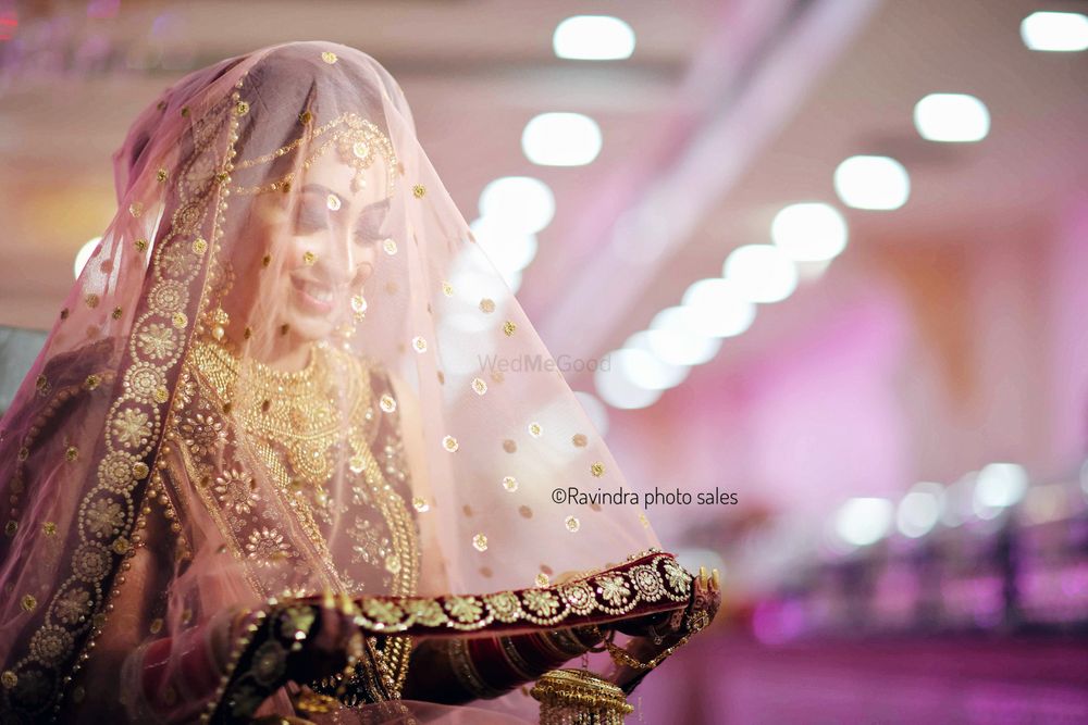 Photo of A sikh bride takes her dupatta as a veil