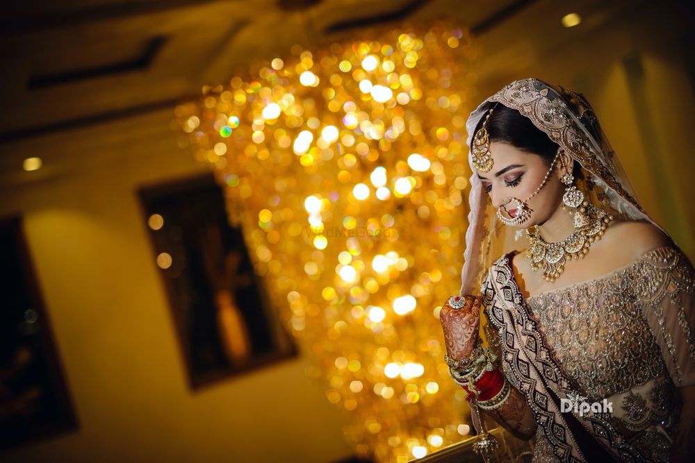 Photo of Silver bridal lehenga with off shoulder