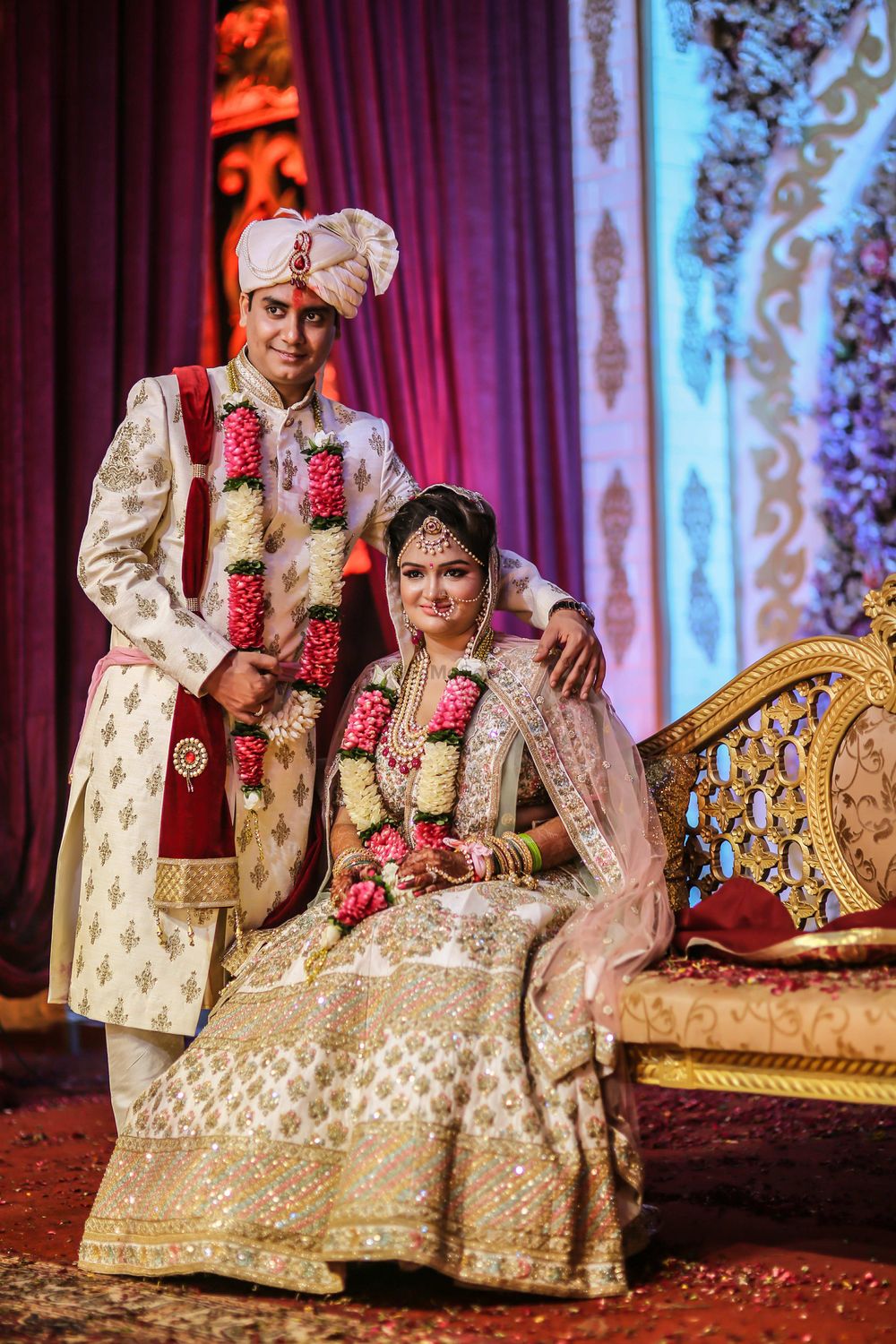 Photo of Sabyasachi bride in ivory with matching groom