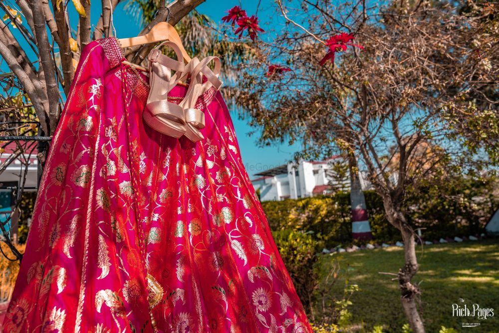 Photo of Bridal lehenga with rose gold heels