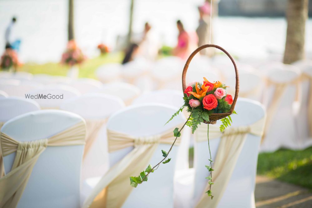 Photo of cane basket with floral arrangements