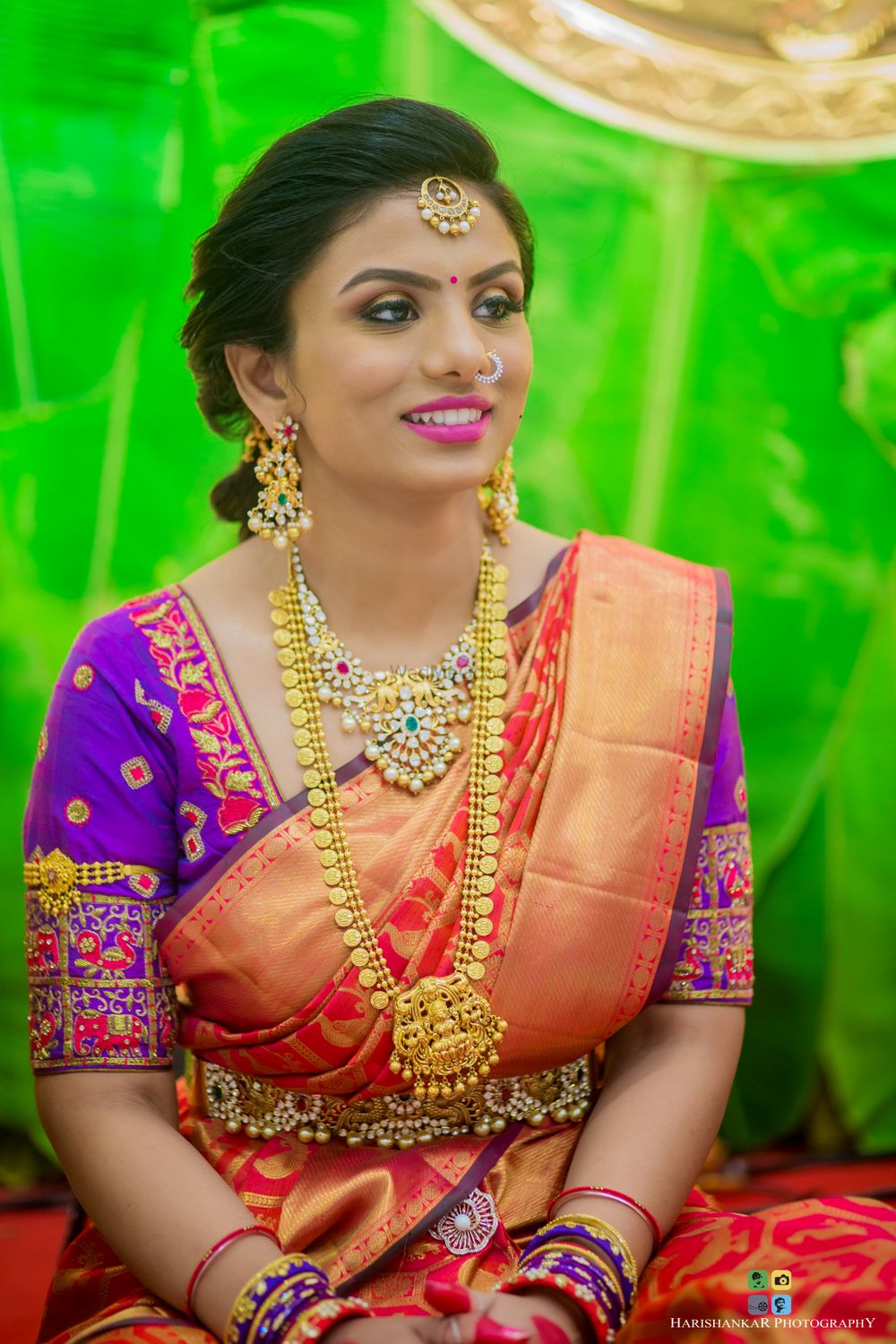 Photo of Orange saree with purple blouse