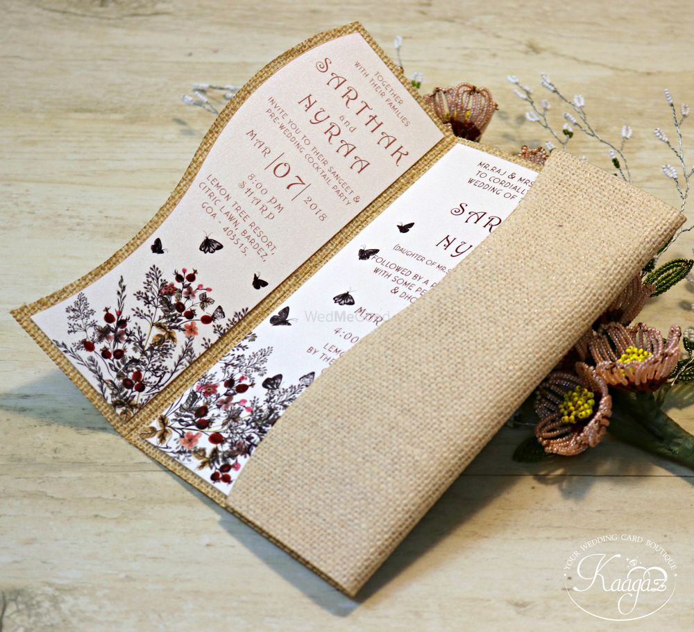Photo of Rustic wedding card with burlap