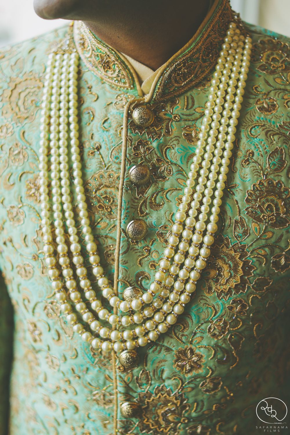 Photo of Pearl groom necklace with mint green sherwani