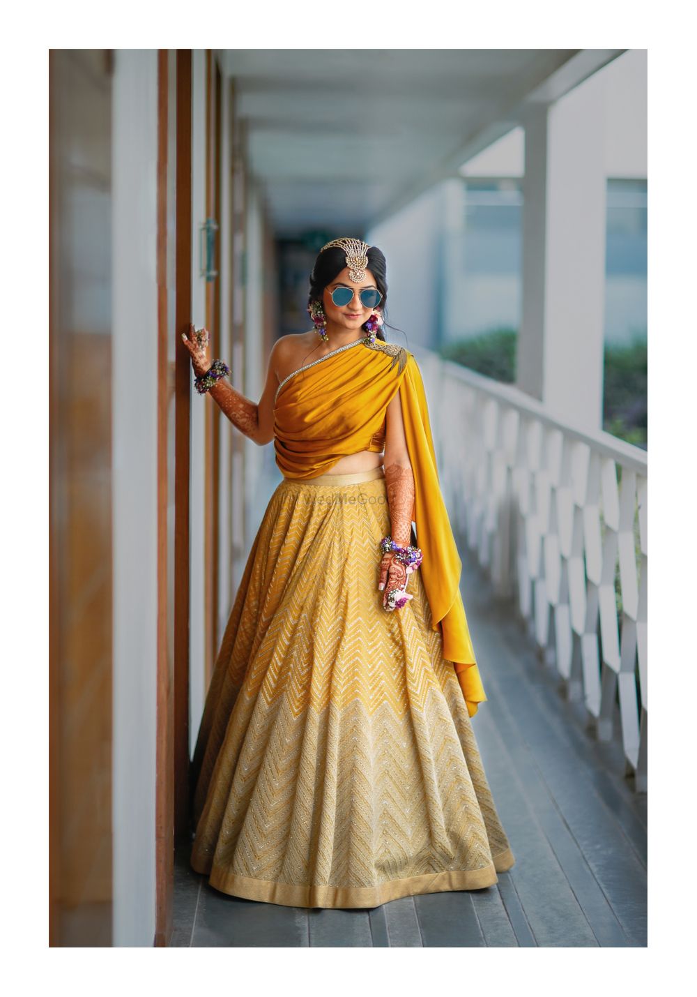 Photo of Indo western mehendi outfit with draped blouse