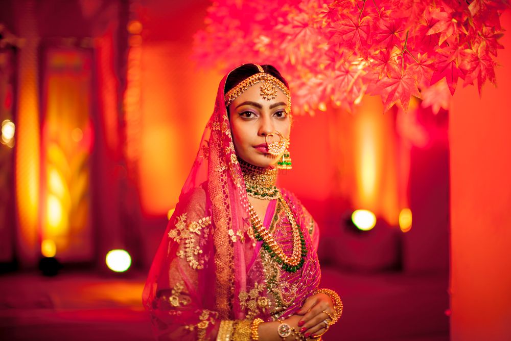 Photo of Red bridal portrait wearing Nath