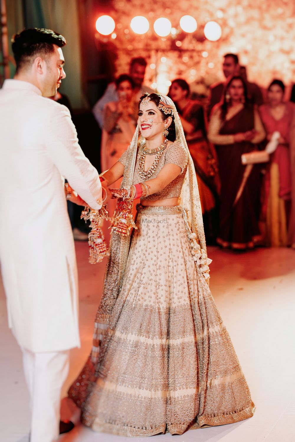 Photo of Happy bride and groom dancing shot