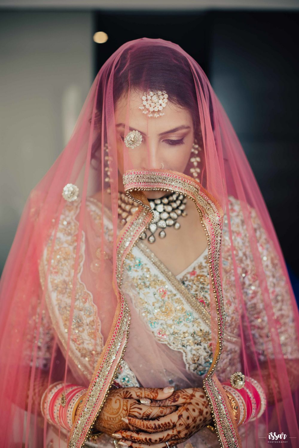 Photo of Wedding day bridal portrait idea with dupatta as veil