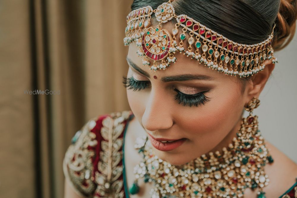 Photo of Beautiful multi-colored mathapatti with polki and kundan stones