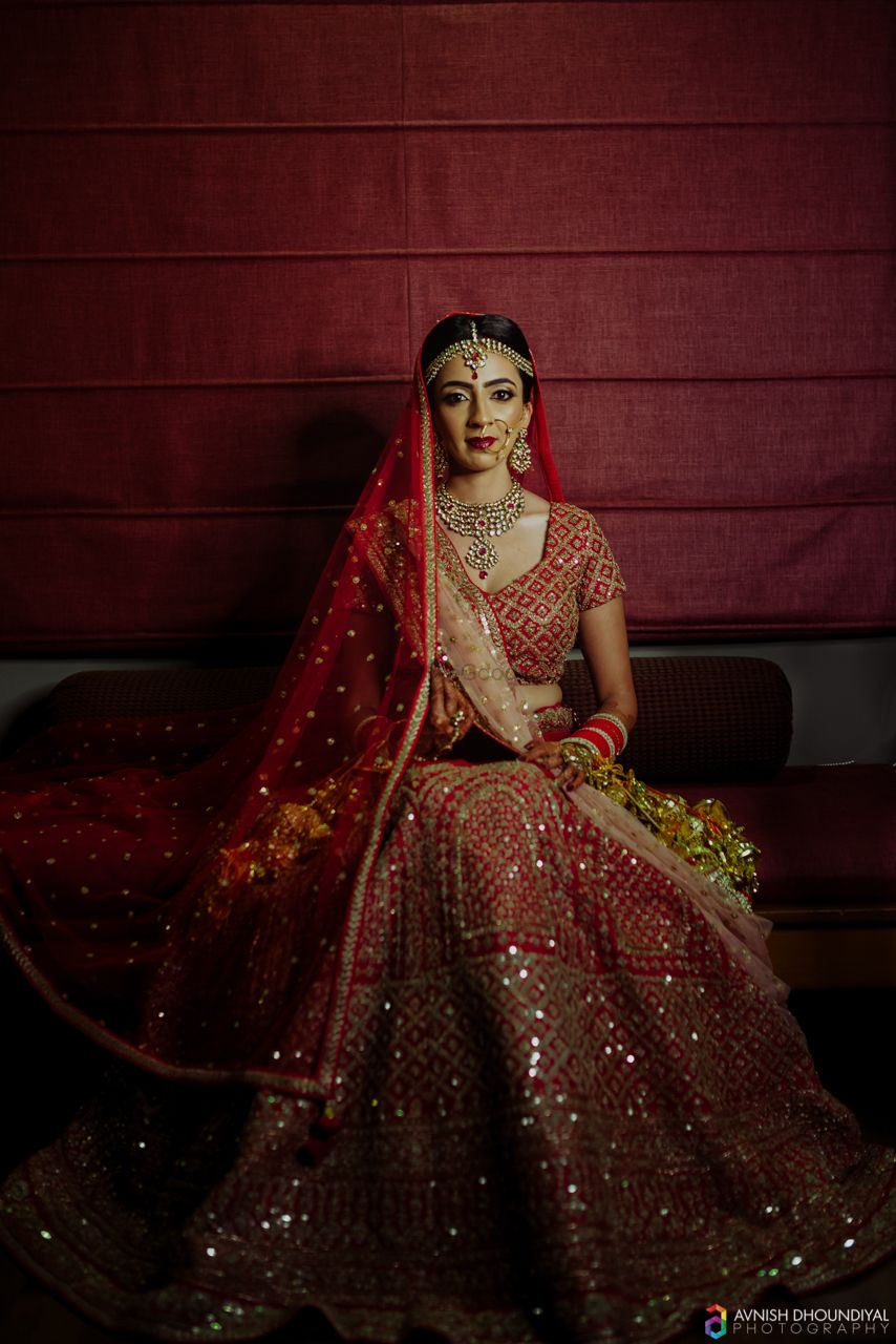 Photo of Dark bridal portrait in red lehenga