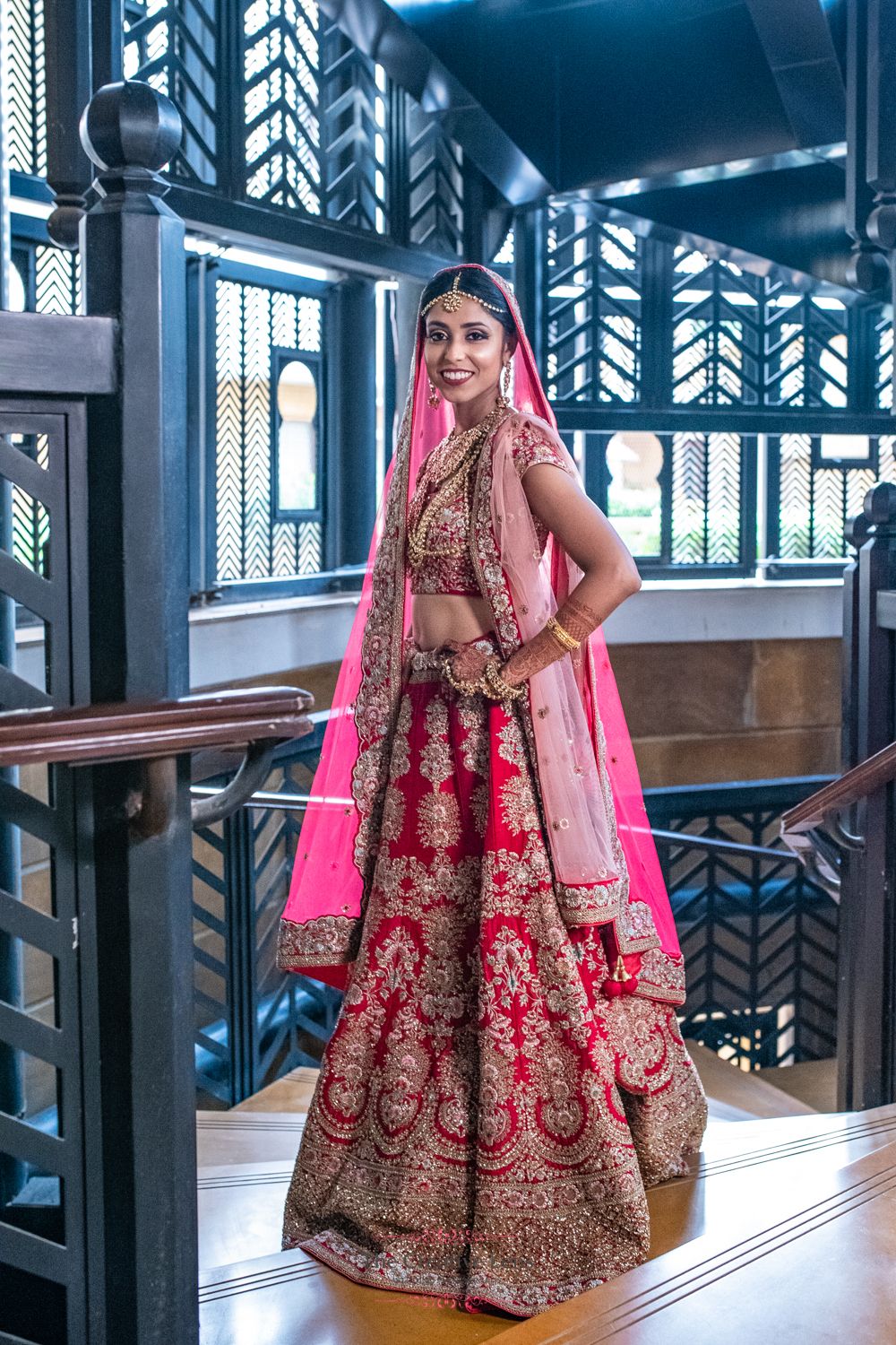 Photo of A bride in red lehenga with double dupatta