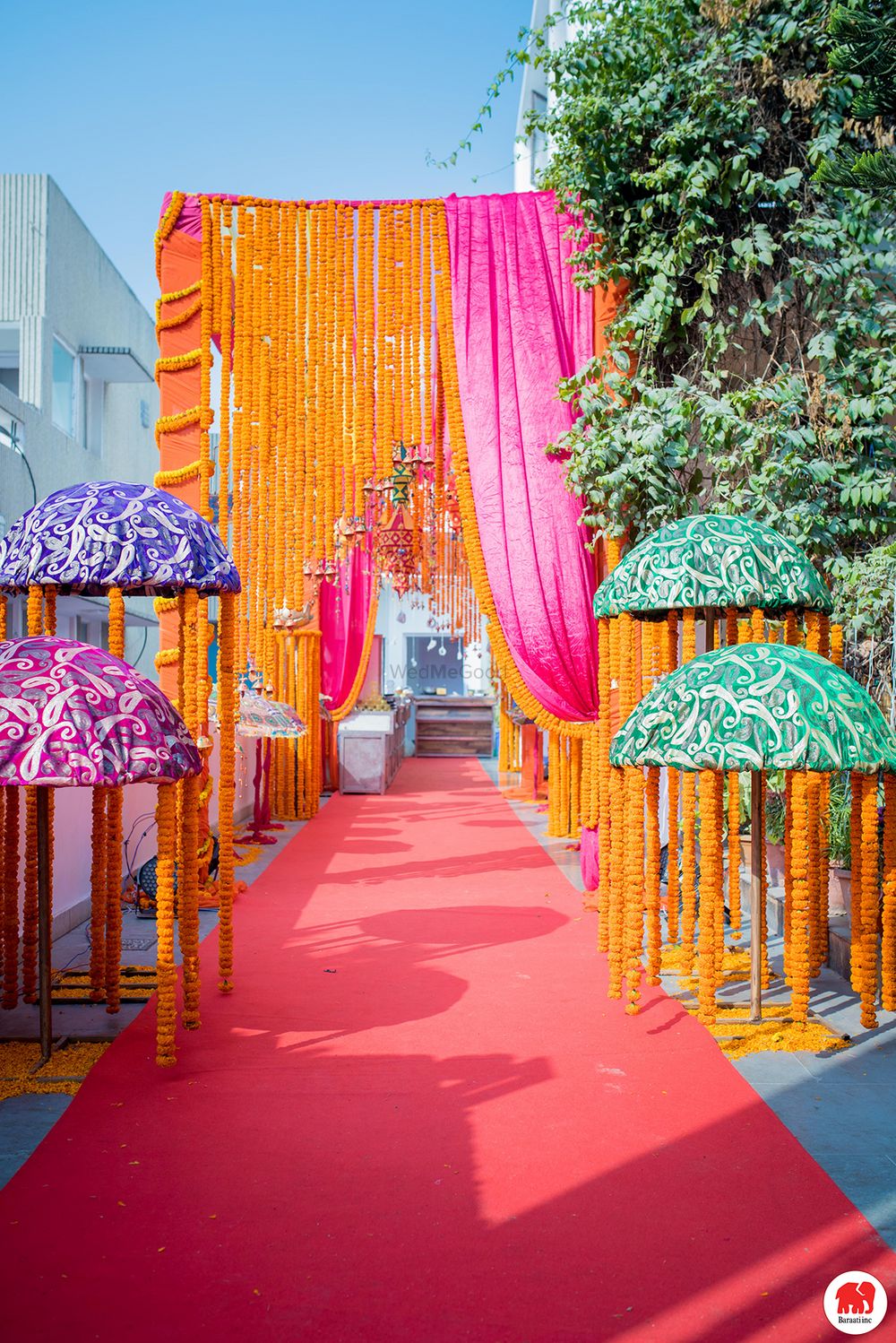 Photo of Floral curtains and umbrella decor for mehendi