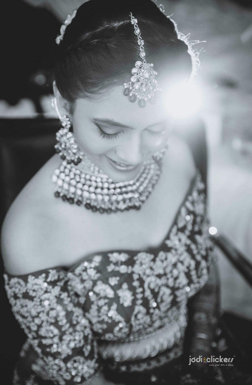 Photo of Black and white bridal portrait with off shoulder blouse