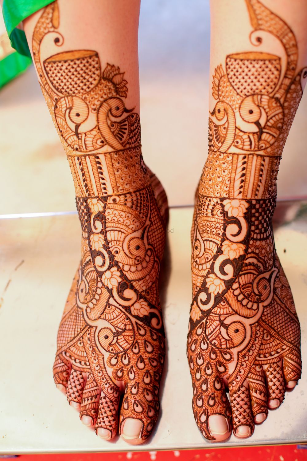 Photo of Peacock Design Mehendi on Feet