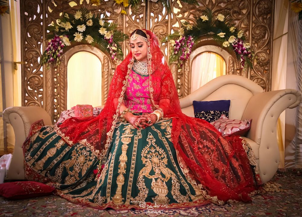 Photo of Stunning bridal portrait with pink and green lehenga