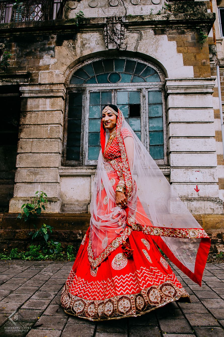Photo of Bridal portrait in red and maroon lehenga