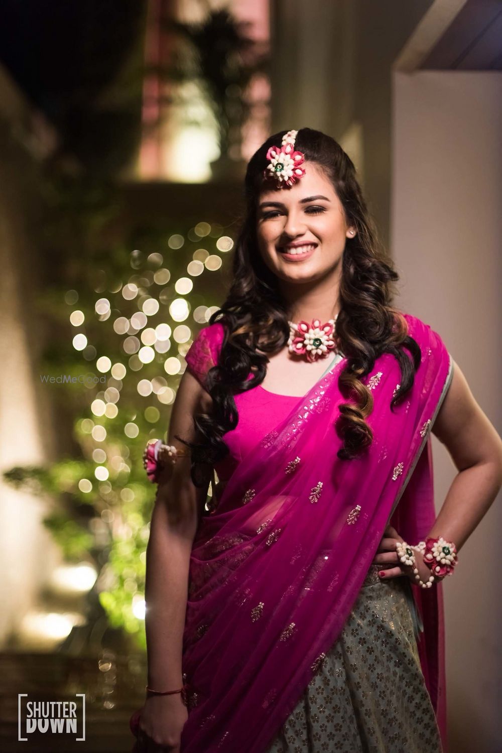 Photo of Simple mehendi look with floral jewellery