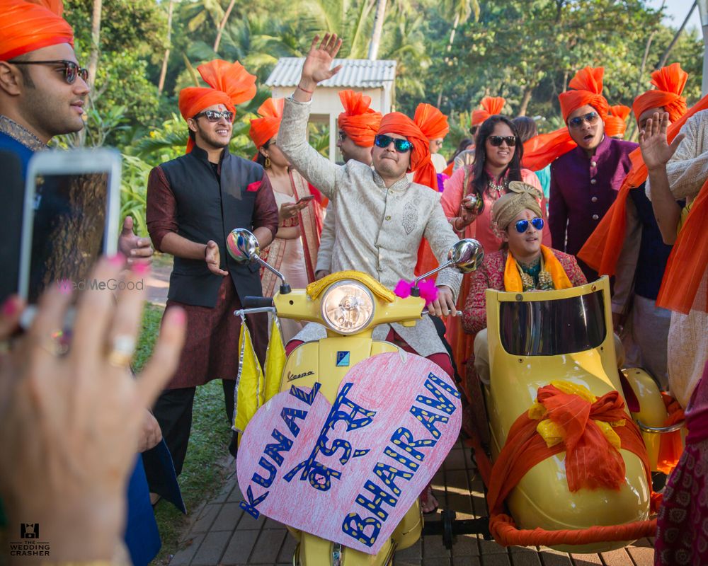 Photo of groom entry on motorbike