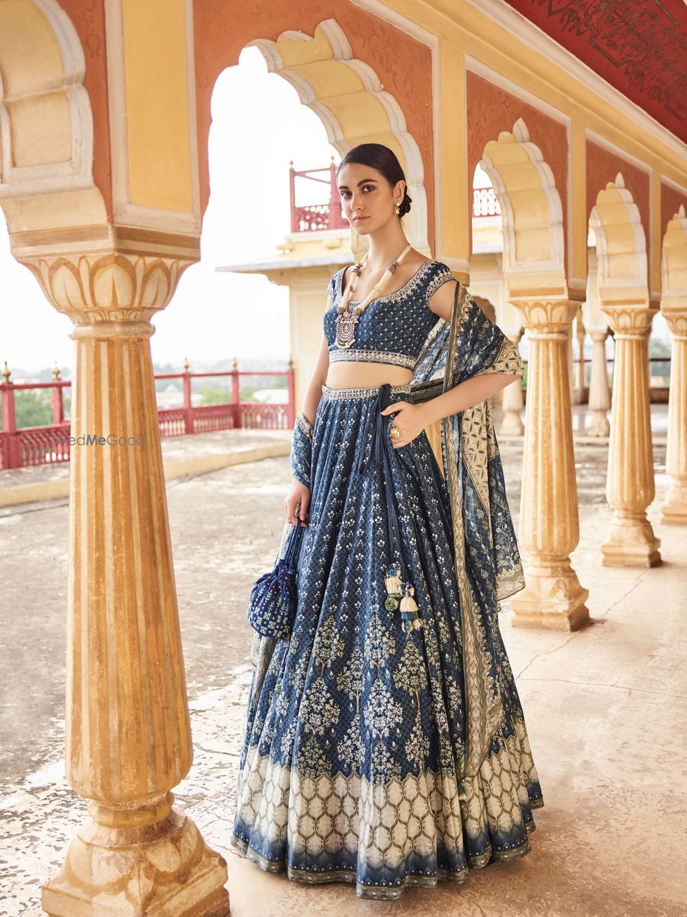 Photo of Dark blue sangeet lehenga with pockets