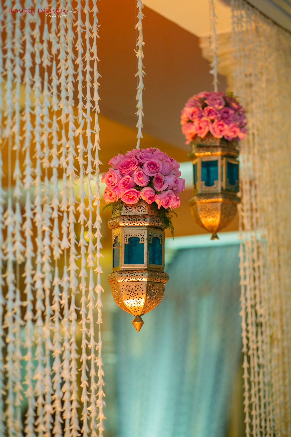 Photo of Floral arrangement with hanging lamps