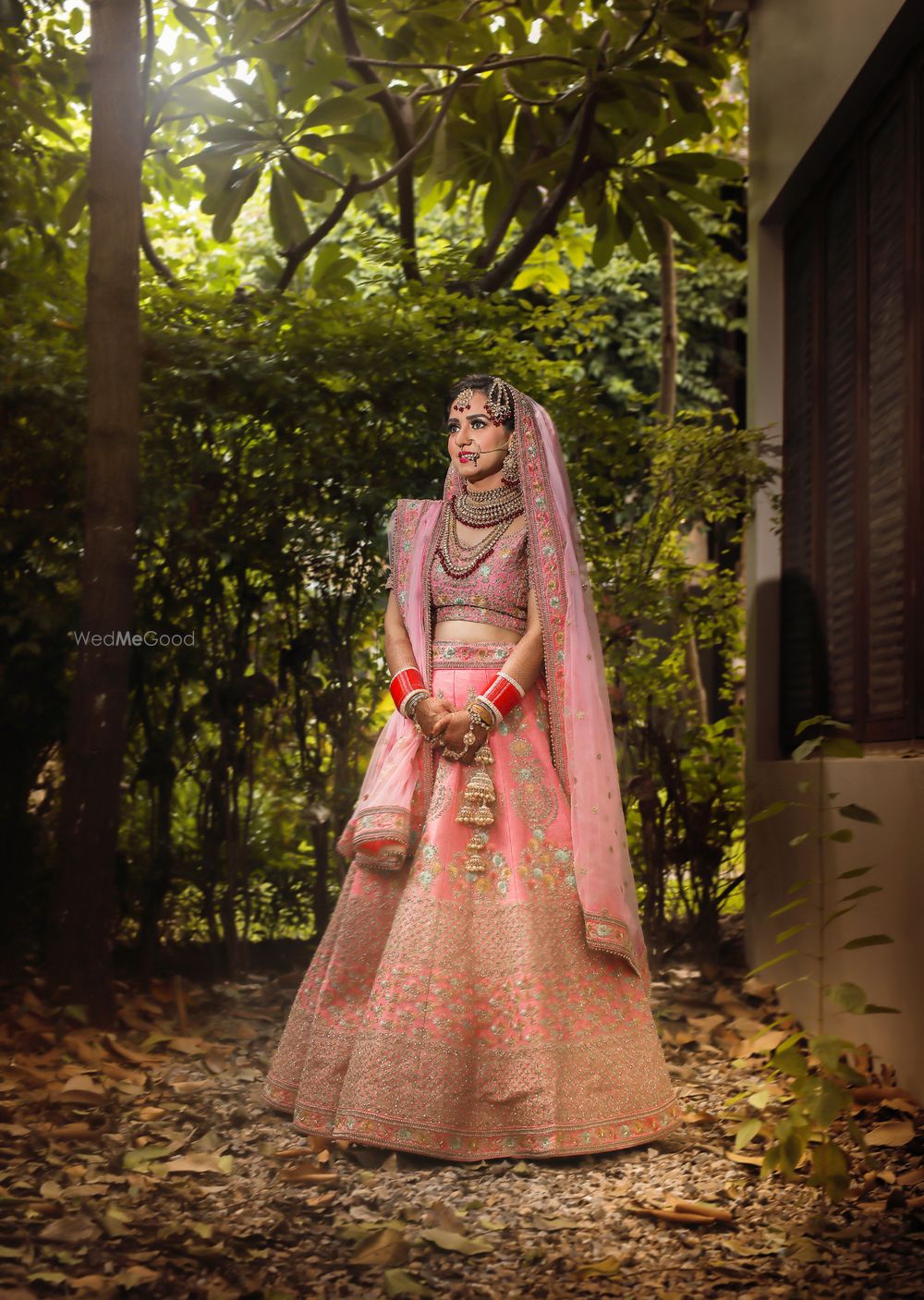 Photo of Ombre light pink lehenga with unique shades