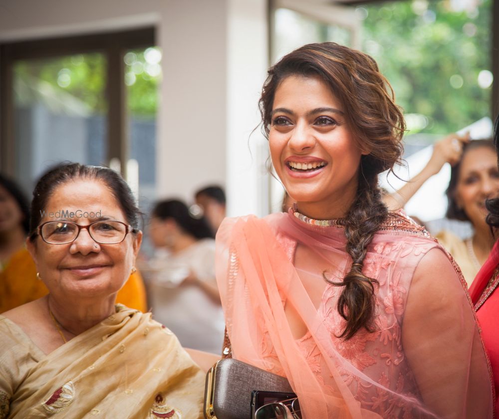 Photo of Kajol at wedding with side braid